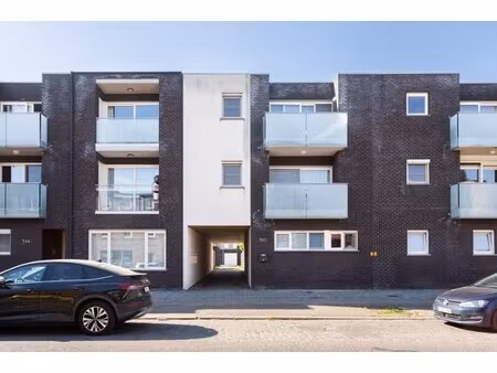 gelijkvloers 2 slp. appartement met tuin en garage in hartje brasschaat!