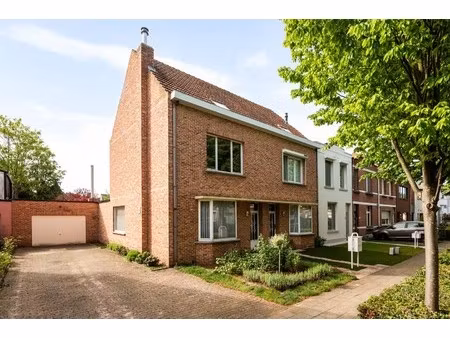 woning met 4 slpk  garage en zuidgerichte tuin