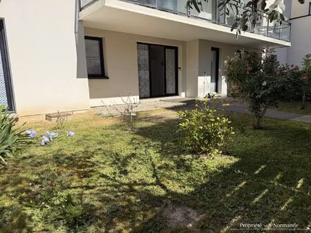 appartement rez-de-chaussée avec jardin et parking