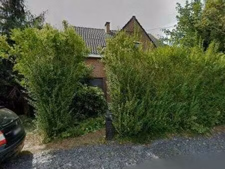 une maison d’habitation à rénover avec rez-de-jardin
