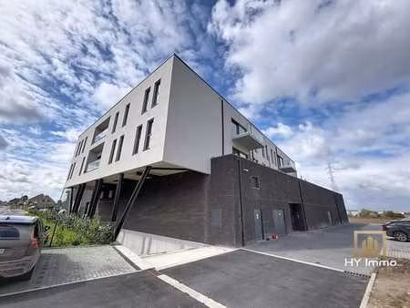 neuf - appartement de 76m² avec 1 chambre + terrasse & parki