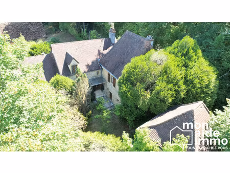 maison en pierre et dépendances  plus d'1ha de terrain