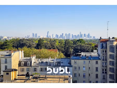 studio rénové 33 m2 balcon 8 m2 vue panoramique tour eif