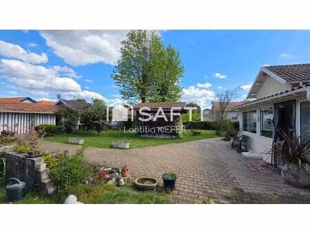 2 maisons sur beau terrain paysagé