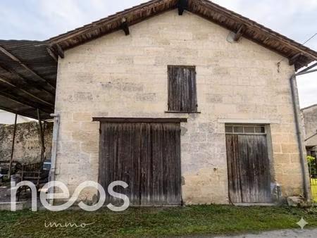 charmant garage en pierre avec jardin – fort potentiel – 52 m²