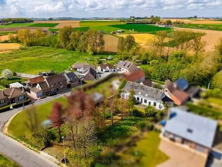 te koop  2 totaal te renoveren woningen op 1.345m² te zwalm