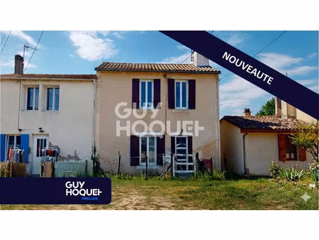 maison à rénover  avec garage et jardin