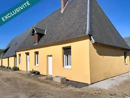 maison avec de beaux volumes  dépendances  terrain de 4000m2 proche le neubourg .