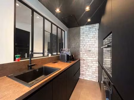 appartement rénové 2 chambres avec garage et balcon
