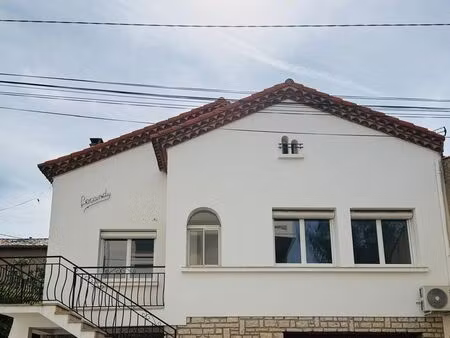 maison 221 m² en centre-ville avec garage et jardin