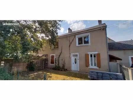 ensemble immobilier comprenant 2 maisons  garage et jardin