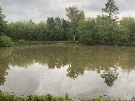 vend terrain de loisirs avec étang