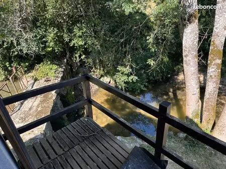 ancien moulin à eau et ses 4hectares 500 de terrain