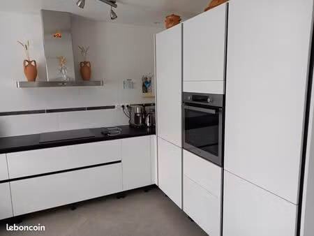 appartement de 90 m² au rdc