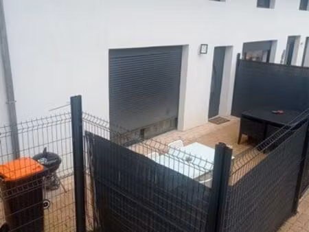 maison mitoyenne triplex f4 avec terasse au centre de dannemarie