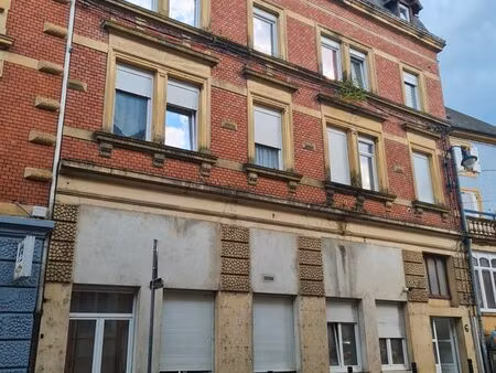 moyeuvre-grande village : immeuble pour investisseurs