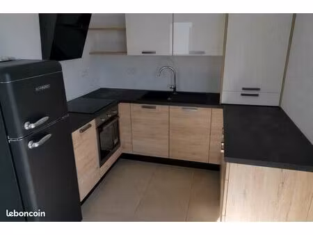 appartement f2 avec garage cave et place privative