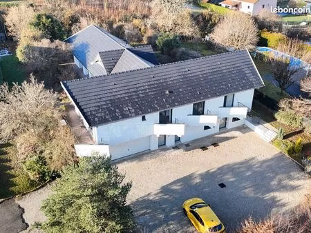 maison d’architecte – secteur calme et prisé – terrain 1700m2 – chauffage au sol – 3 logem