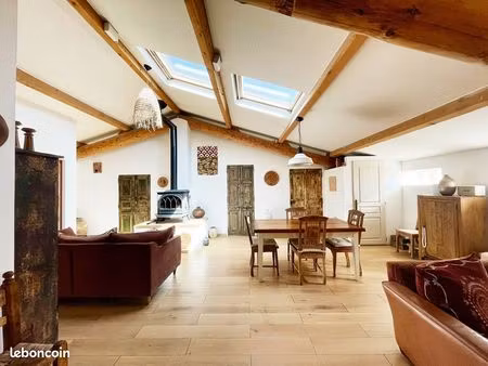 ensemble immobilier : appartement 110m² + terrasse + local pro