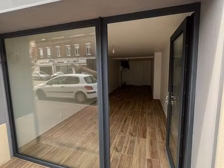 immeuble refait intégralement à neuf  rue principale avec places de parking et jardin inté