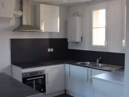 appartement f3 de 57m2  avec balcon  cave  garage + parking