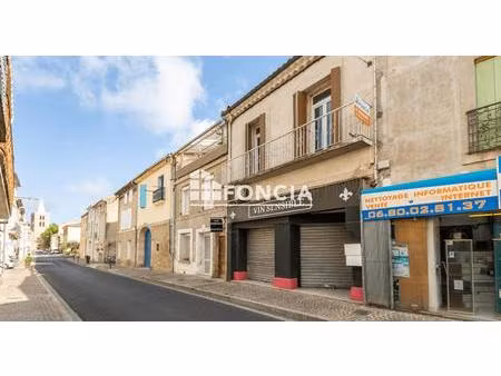 immeuble de rapport composé d'un local et d'un appartement 3 pièces