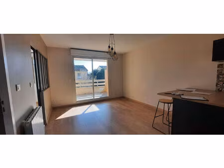 a louer - roquettes - appartement t2 d'une surface de 35.64 m² avec balcon et place de par