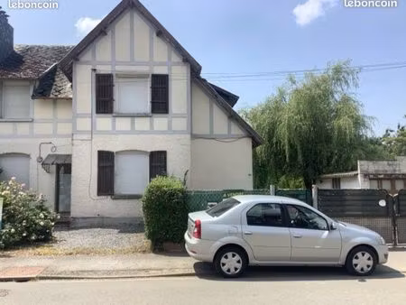 ensemble immobilier  2 maisons  garage et terrain clôturé