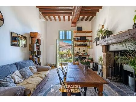 appartement de caractère avec jardin  au coeur d'un village préservé