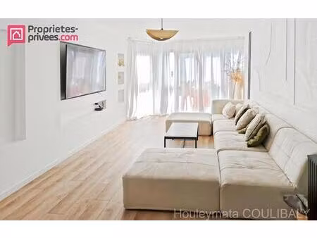 appartement 3 pièce(s) 92 m2 - cave et emplacement privatif