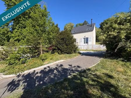 maison rénovée avec grand terrain et garage