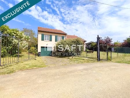 maison individuelle sur demi niveau avec garage et grand jardin