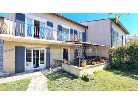 vente d'une maison avec local professionnel terrain paysagé garage et piscine