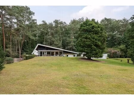 architecturale sixtieswoning in volledige privacy en uniek natuurlandschap!