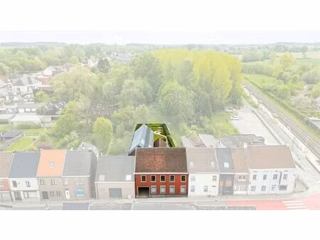 ruime woning met grote garage/loods/multifunctionele ruimte