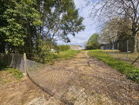 terrain 801 m2 constructible avec garage de 30 m2  assainiss