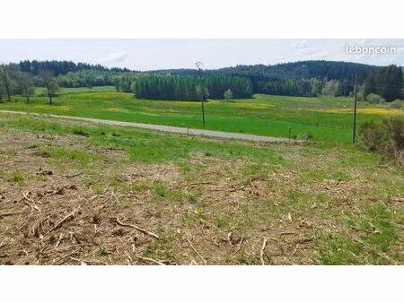 terrain constructible 1299 m2 rare avec vue imprenable  tranquille et proche centre-bourg 
