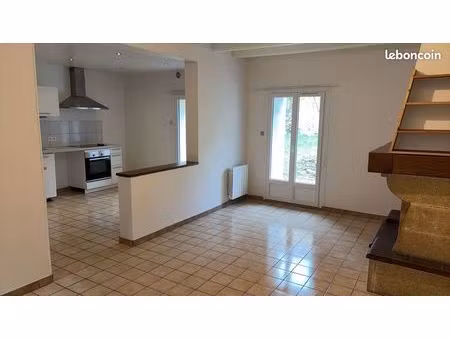 maison avec garage et jardin proche centre ville