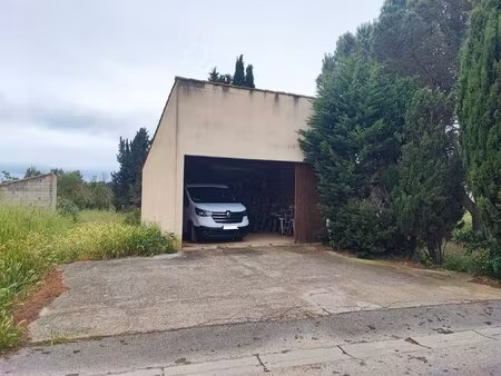 garage avec terrain