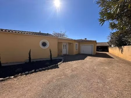 villa avec garage et abris voiture