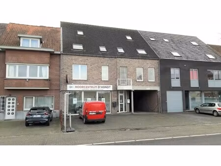 gelijkvloers appartement met terras en autostandplaats