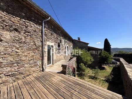 maison en pierre de 160 m² avec revenu locatif + terrain constructible