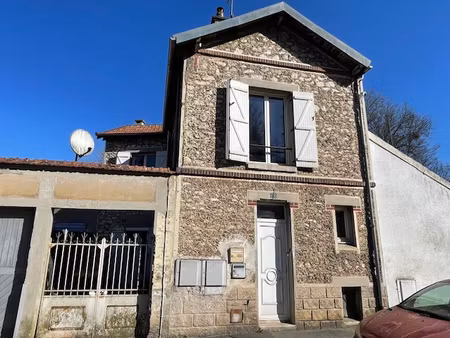maison divisée en 2 logements