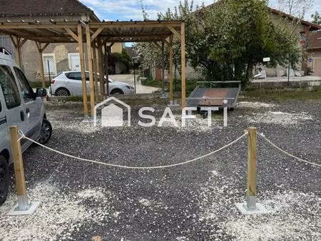 place de stationnement double avec carport