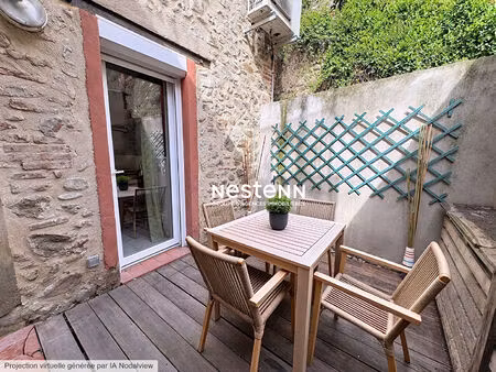 maison en pierre rénovée  garage  terrasses et t2 indépendant