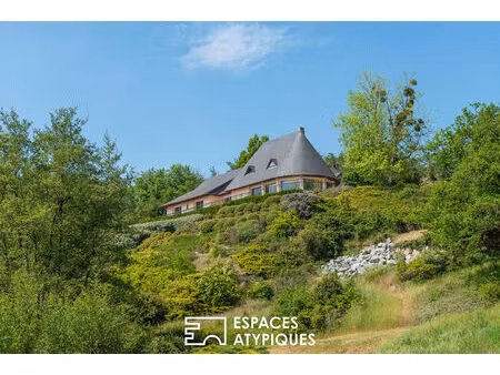 maison de charme avec étang dans un cadre verdoyant