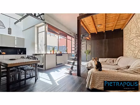 t2 style indus de 64 m² avec terrasse 10 m² et parking