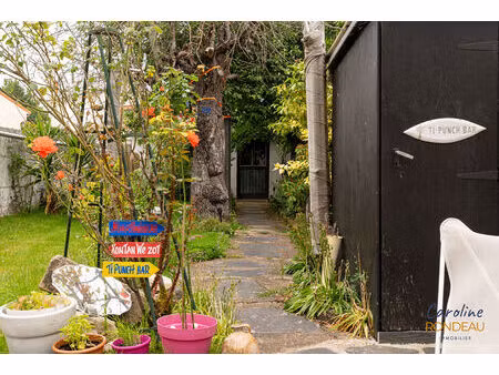 a vendre nantes est maison avec garage et jardin.