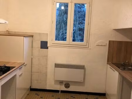 logement f4 + terrain et buanderie