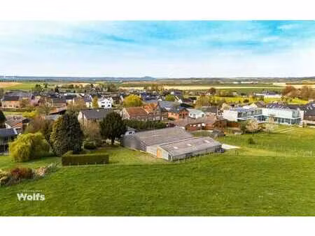 entrepôt de +/- 450 m² avec charmante maison !
